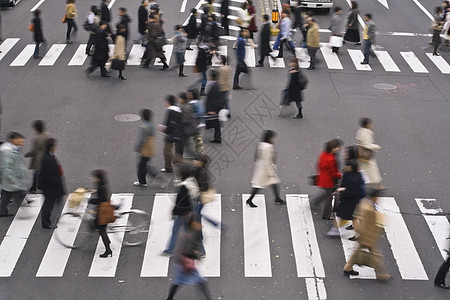 跨越街口的人行人市中心时间生意人人群商业公民喧嚣团体路口图片