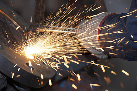 燃烧火工业机械师火花维修工作蓝色焊机职业制造业金属图片