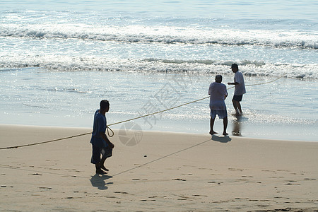 渔业热带波浪工作假期绳索男人旅行海滩海岸海洋图片