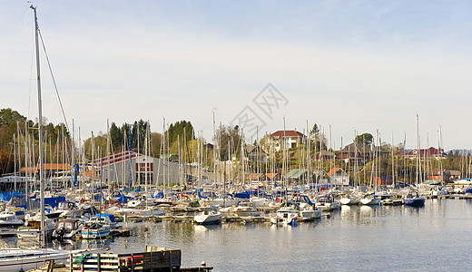 游艇港地平线日光太阳海浪天空海岸双体环境码头桅杆图片