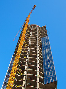 正在建造的建筑工作活动生长天空光束建筑学蓝色劳动摩天大楼玻璃图片