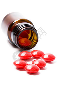 装有红色药丸的玻璃瓶宏观疾病剂量药物治疗治愈药店处方止痛药制药图片