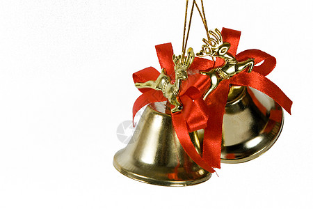 白色背景上的两个手铃风格金子小玩意儿新年丝带感恩金属假期装饰季节图片
