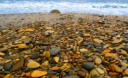 冲浪岩石宏观气泡海岸线盐水海浪边缘城市海滩支撑图片