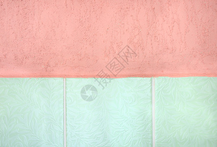 粉色墙粉红土豆和绿砖墙粉色绿色裂缝背景