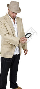侦探和放大镜镜片帽子男性玻璃白色间谍套装男人照片调查图片