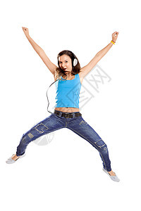 舞蹈和听音乐快乐微笑女士耳机幸福女孩白色黑发跳跃喜悦图片