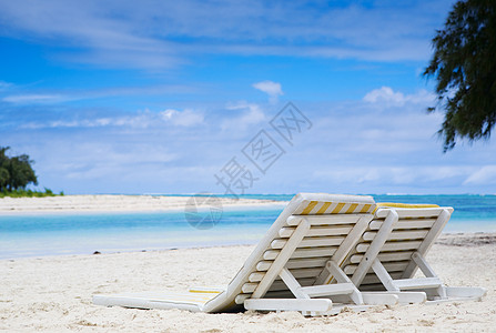 天堂乐园支撑晴天蓝色天空假期躺椅旅行旅游热带日光图片