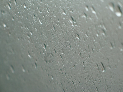 降雨圆圈圆形灰色玻璃气泡波纹水分滴水水滴窗户图片