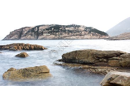 岩石海岸背景海洋日落天气热带地平线季节流动旅行场景假期图片