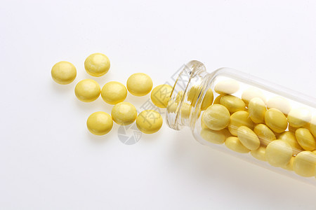 黄色药丸水平药品草药瓶子照片药物治疗帮助小瓶玻璃图片