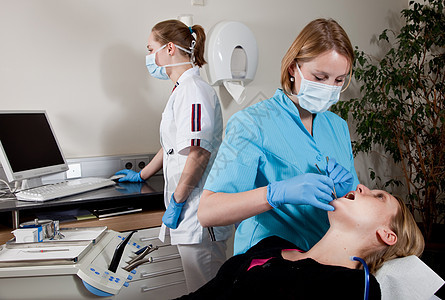 牙科诊所病人金发矫正职业助理临床医生保健手套牙齿图片