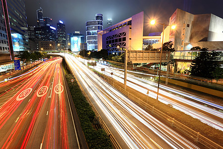 晚上在香港辉光速度运输城市景观运动驾驶公共汽车商业线条图片