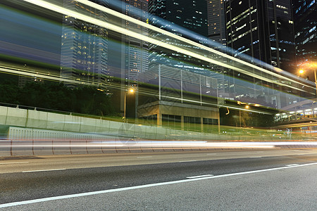 夜间交通蓝色景观场景商业公共汽车旅行市中心车辆街道速度图片