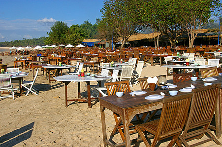 海滩上的餐馆梦境海鲜桌子旅行生活度假村餐厅海岸咖啡馆背包图片
