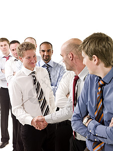 商务人士握手握手领带套装男人团体友谊职业商务成人业务人士图片