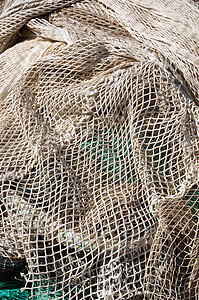 渔网捕鱼网绳索工具渔业缠绕海洋细绳图片