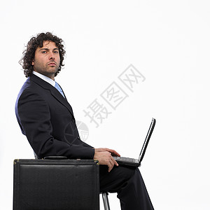 笔记本电脑商务人士阶层白色桌子男性化管理人员男人公司白领椅子男性图片