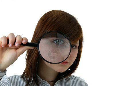 有放大镜的年轻学生美丽女孩镜片间谍科学白色检查工作室好奇心商业图片