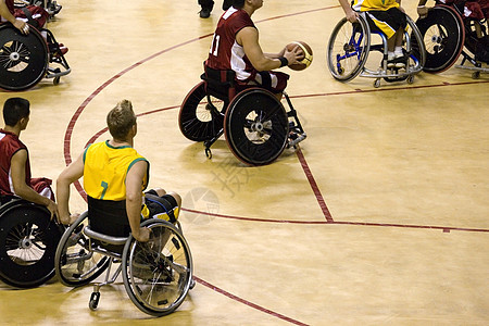 残疾人轮椅篮球主席男竞赛竞争狂欢节车轮椅子火柴娱乐比赛挑战运动背景图片