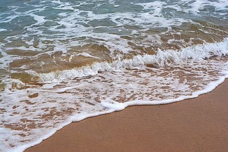 海滩的波浪海滨天堂热带海浪假期旅行孤独飞溅海岸线支撑图片