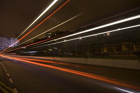 夜里交通堵塞指标尾灯航程旅行车道踪迹速度蓝色大灯驾驶图片