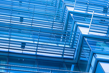 现代建筑的窗户用蓝色制成反射公司市中心镜子摩天大楼成功财富城市金融玻璃图片
