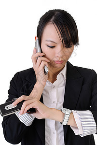 繁忙的女商业妇女女孩生意人手机手表成功数字办公室套装电话职业图片