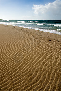 美丽的沙滩沙沙堆海浪海岸地平线假期旅行太阳海景沿海风景冲浪图片