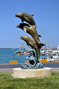 海豚雕像血管港口码头海洋背景图片