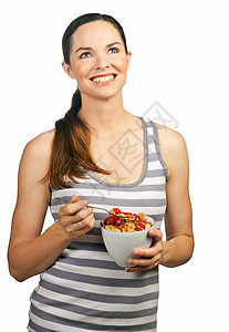 美丽的年轻快乐的女士 拿着一碗健康的麦饭图片