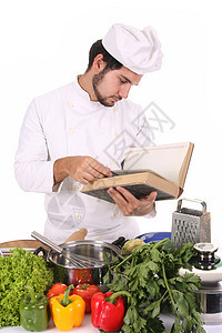 准备午餐的年轻厨师餐厅微笑盘子男性职业工人工作烹饪乐趣衣服图片