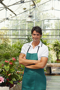 花艺家生意花店商业职业花卉幸福双臂男性植物营业员图片