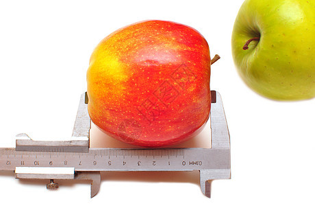 测量的红苹果腰部水果厘米重量尺寸饮食食物绿色白色健康图片