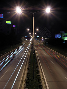 夜里漫漫小径城市驾驶运动汽车夜景速度街道辉光机动性图片