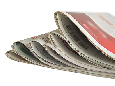 特写白上孤立的彩色报纸列表分析师杂志代理人读者作家出版商专栏作家广告记者柱子图片