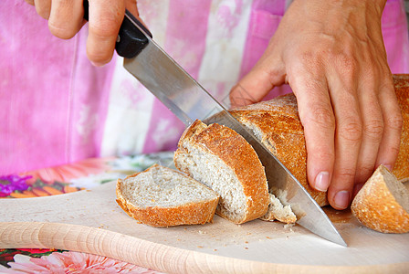 切面包木板谷物小麦主妇烹饪糖类营养玉米面粉厨房图片