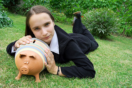 女孩与猪猪公园安全现金商业青年小猪银行金融喜悦盒子图片