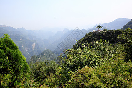 世界地貌公园云泰山的景象寺庙树木踪迹地质学吸引力森林溪流旅游蓝色茶点图片