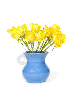 花瓶中的美丽花束色彩多彩的黄玫瑰背景图片