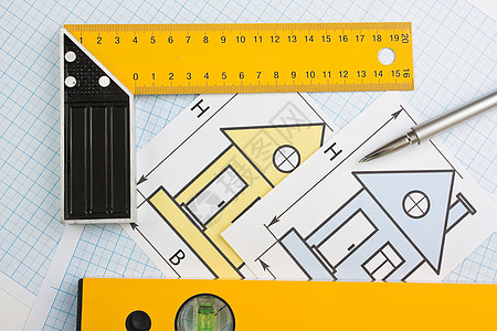 使用建筑工具在家用绘图工具建筑草图测量磁带办公室建造工作仪表房子图片