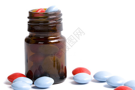 装有红色和蓝色药丸的奶瓶药物止痛药瓶子胶囊药店玻璃化学剂量治愈疾病图片