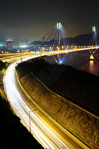 深夜及高速公路廷九桥旅行场景运输蓝色车辆运动市中心射线景观曲线图片