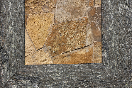 由岩石制成的墙壁结构建筑棕色石墙石头石工褐色材料历史图片