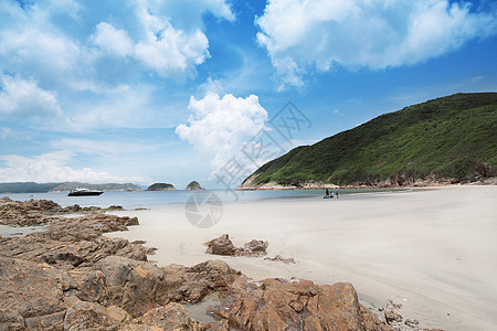 海滩热带日光蓝色阳光海岸风暴地平线天空海岸线岩石图片