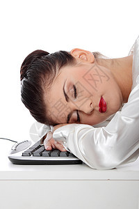 睡在键盘上的女商务人士工作商务学习秘书学生办公室成功电脑黑发技术图片