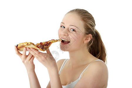 年轻快乐的女士 吃比萨饼成人青少年饮食午餐头发微笑冒充食物女孩金发女郎背景图片