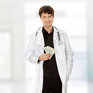 一个有钱的英俊医生货币账单商务职业保健男人金融药品人士口袋图片