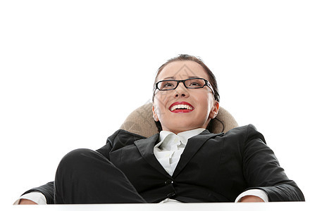 年轻女商务人士在办公桌休息经理女孩套装女士微笑椅子办公室商业思维工作图片