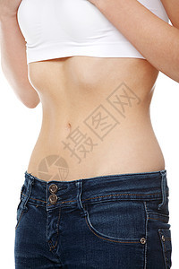 美丽的年轻有厌食症的少女腰部压痛短裤女士女性腹部饮食牛仔裤运动身体图片